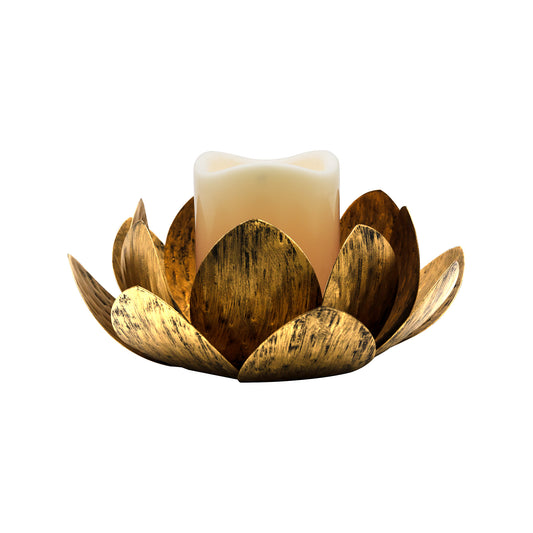 A gold metal lotus-shaped candleholder with a battery operated LED candle in the center.