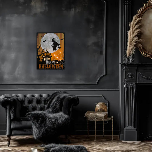 Halloween-themed wall art in a dark room with a sofa and fireplace.