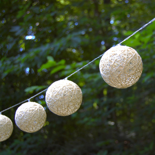 Solar-Powered String Lights with 20 White Cotton Globes