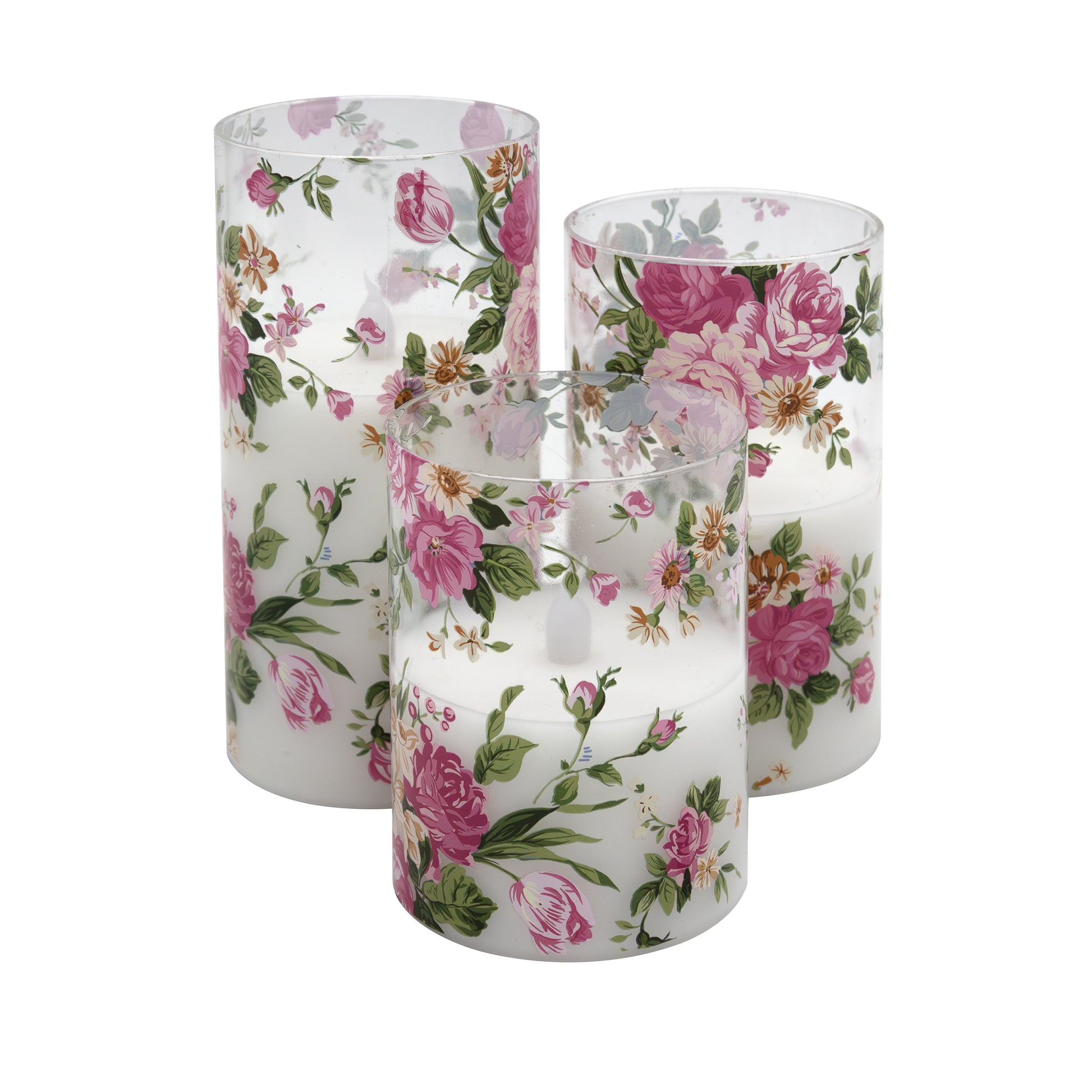 Set of three battery operated clear glass hurricane candles with a floral design, featuring a wax candle inside and an LED light visible through the glass.