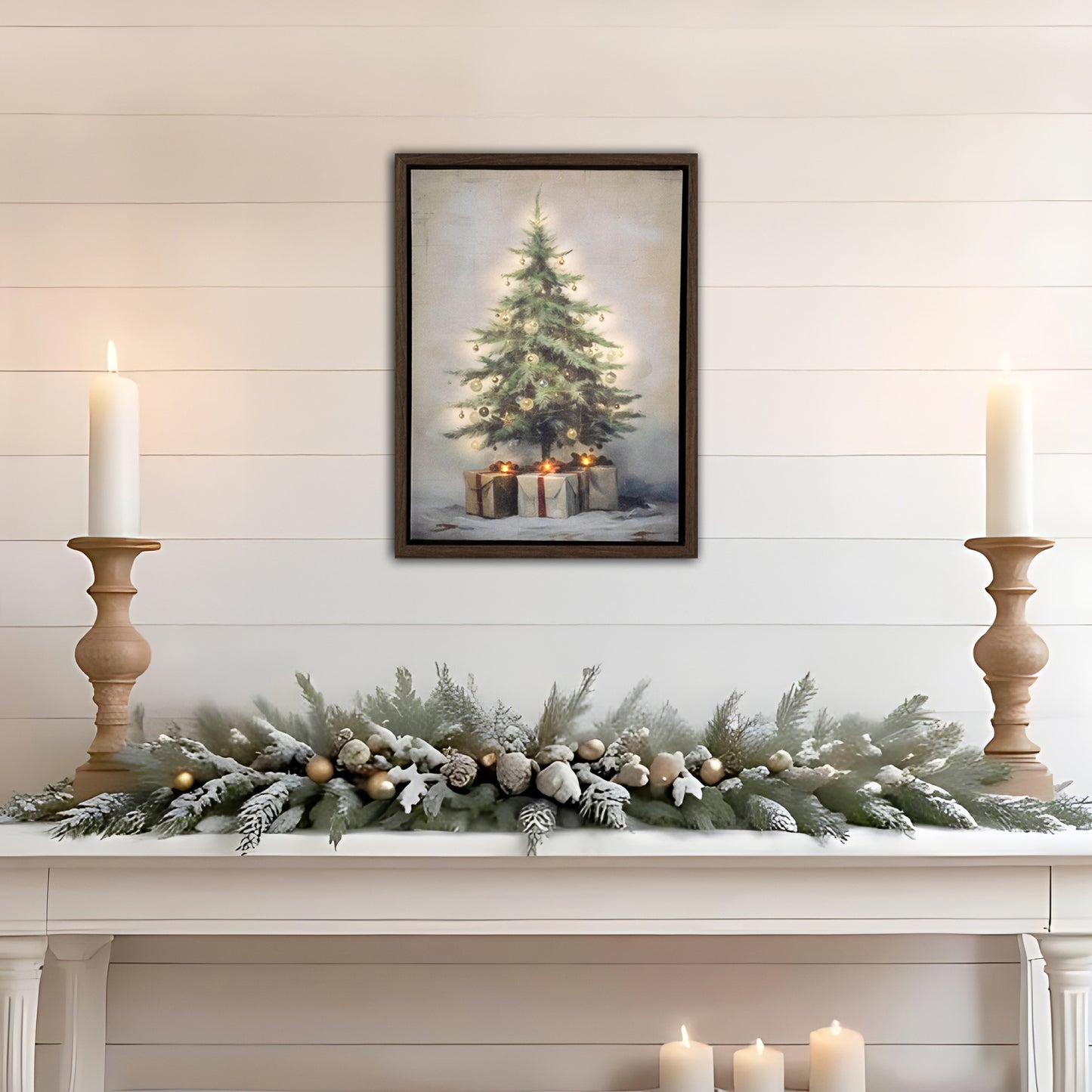 Decorative Christmas mantel with garland, candles, and framed artwork of a Christmas tree.