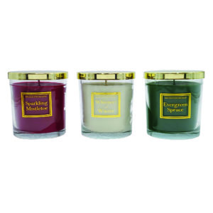 Christmas scented candles in a set of 3 smelling of Winter Evergreen and Spruce, and Mistletoe.