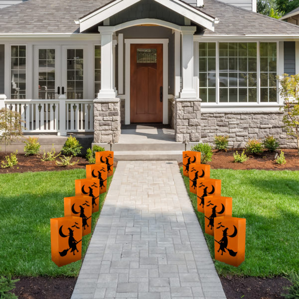 Halloween Luminaria Bags with Battery Operated Light and Witch Design Line the Front Home Pathway.